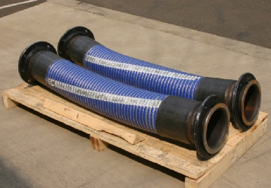 Click to enlarge - Multi plies of heavy duty polypropylene fabric and film are used to create a large bore hose for transfer of hydrocarbons, yet, still very flexible. Stainless steel inner and outer helical wire. 